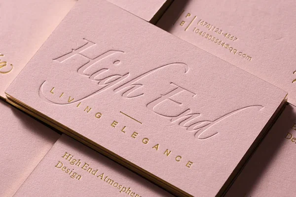 Luxury embossed business card with foil accents for high-end branding.
