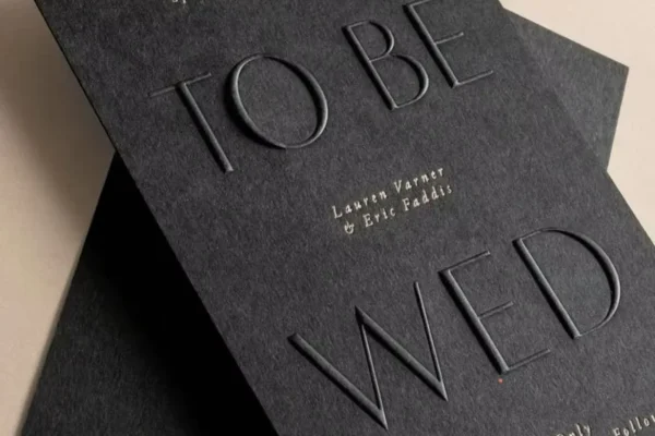 Embossed card with custom text, ideal for business or formal invitations.