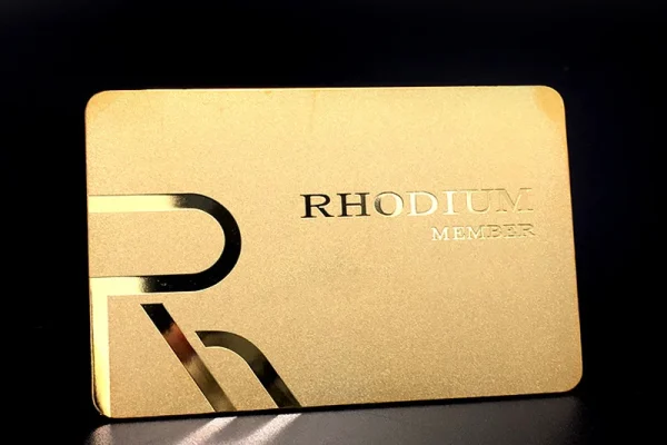 PVC Cards — plastic card #1217 Gold membership card with 'RHODIUM MEMBER' text, showcasing plastic card printing.